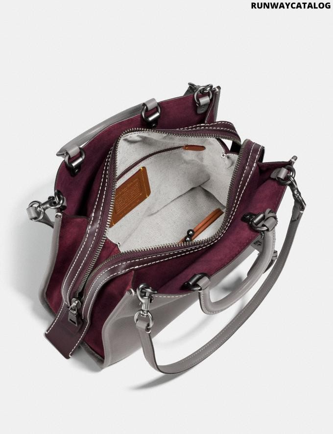 Coach rogue with quilting and rivets handbag - Runway Catalog