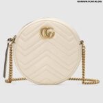 GG Marmont mini round shoulder bag