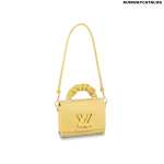 Louis Vuitton Twist MM Bag in Ginger Yellow