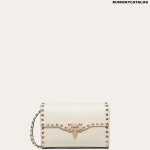 SMALL ROCKSTUD GRAINY CALFSKIN CROSSBODY BAG