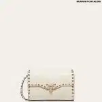 SMALL ROCKSTUD GRAINY CALFSKIN CROSSBODY BAG