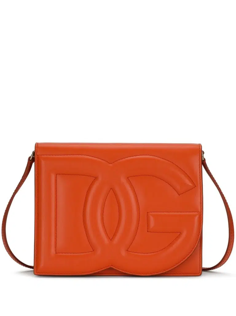 Orange Dolce & Gabbana DG Logo crossbody bag with embossed logo, gold-tone hardware, and adjustable strap.