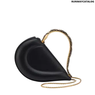 Bvlgari Serpenti Cuore 1968 top handle bag in black calf leather with a serpentine metallic handle and multicolored enamel details.