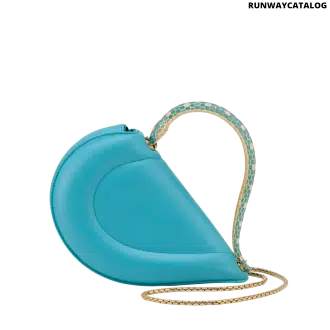 Bvlgari Serpenti Cuore 1968 top handle bag in feroza turquoise calf leather with a serpentine metallic handle and multicolored enamel details.