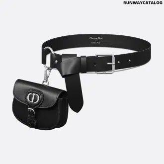 Dior Symbol Belt in black calfskin with a CD-engraved silver-finish pin buckle and a removable Dior Bobby pouch for a functional yet stylish accessory.