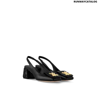 Louis Vuitton Shake Slingback Pump in black lambskin with a Malletage-patterned block heel and LV accessory for a refined statement look.