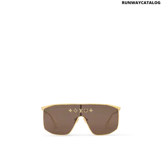 LV Golden Mask sunglasses with a gold-toned metal frame, brown lenses, 5 Elements studs, and engraved Louis Vuitton branding on the temples and end tips.