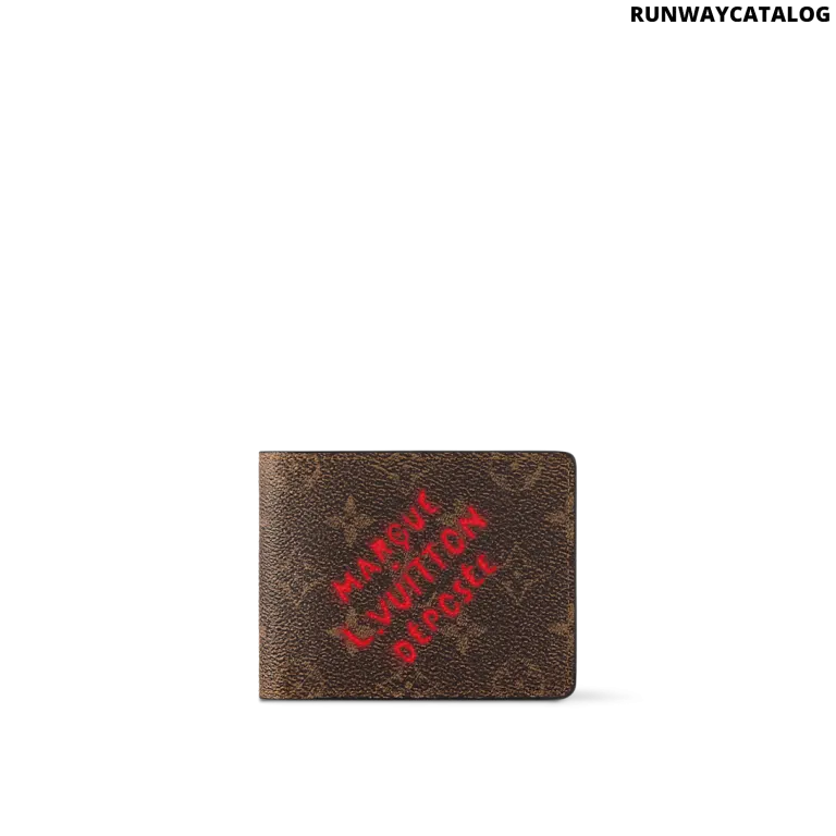 Louis Vuitton Multiple Wallet in Monogram Dust canvas with red "Marque L.Vuitton Déposée" print, aged leather trim, and multiple compartments.