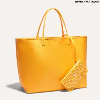 Goyard Anjou GM bag featuring a reversible leather and Goyardine canvas design, spacious interior, and ergonomic handles for all-day comfort.