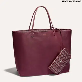 Goyard Anjou GM bag featuring a reversible leather and Goyardine canvas design, spacious interior, and ergonomic handles for all-day comfort.