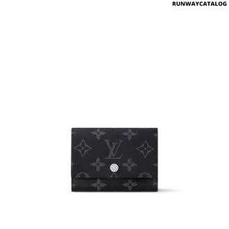 Louis Vuitton Victor Wallet in Monogram Eclipse canvas with a snap button closure, multiple card slots, and a zipped coin pocket.