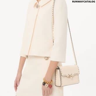 Small Rockstud Grainy Calfskin Crossbody Bag