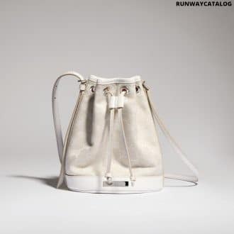 Mini bucket bag with Gucci plaque
